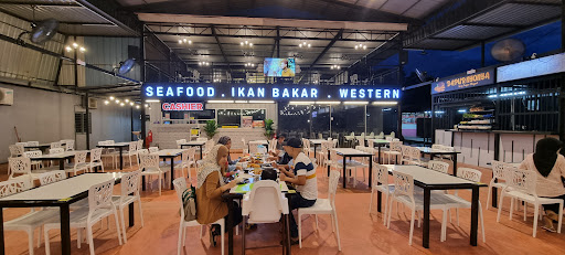 Amysha Village Ikan Bakar, Seafood & Western Kempas Amysha Village Ikan Bakar, Seafood & Western Kempas